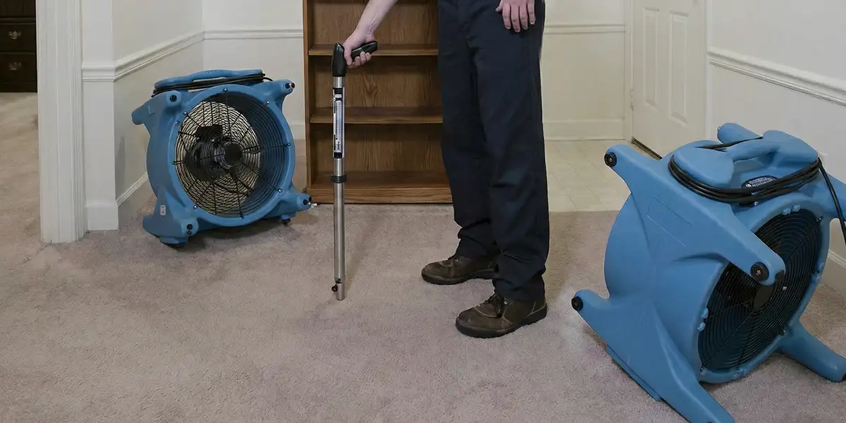 emergency water removal equipment deployed to dry a flooded residential interior in Overland Park, KS