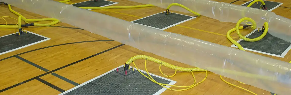 water clean up drying system set up to remove moisture and prevent further damage in Overland Park, KS