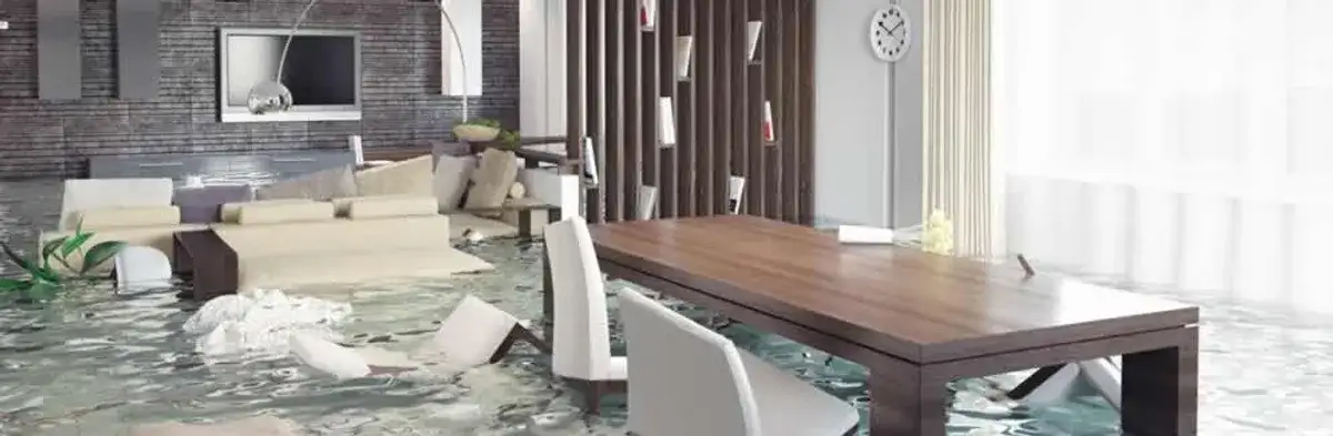 home interior affected by water damage with flooded floors and displaced furniture in Overland Park, KS